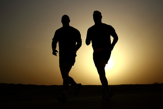 photo of people running